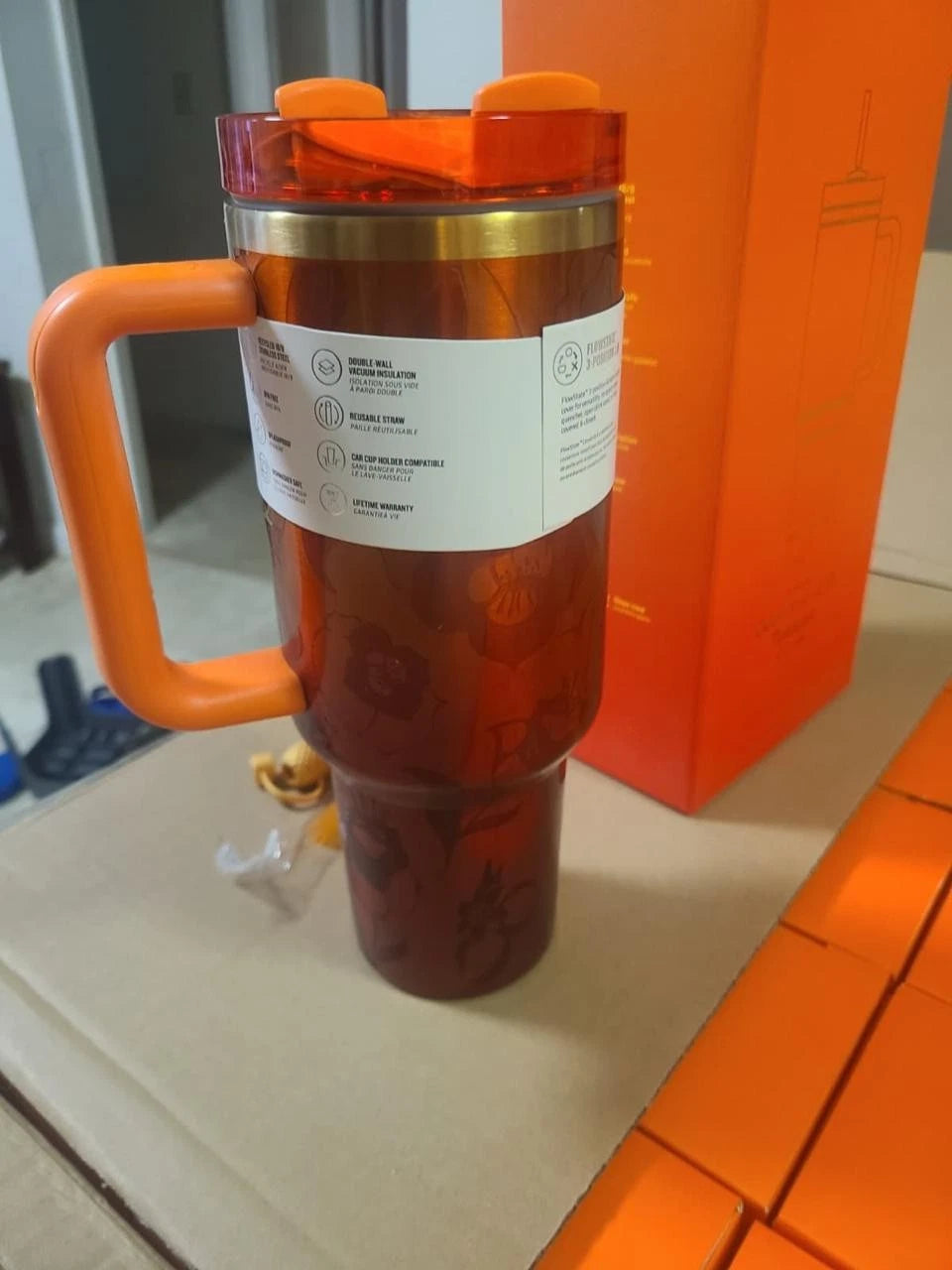 Stanley Quencher H2.0 FlowState 40oz Tumbler – Orange Handle, Straw & Karol G Floral Lid