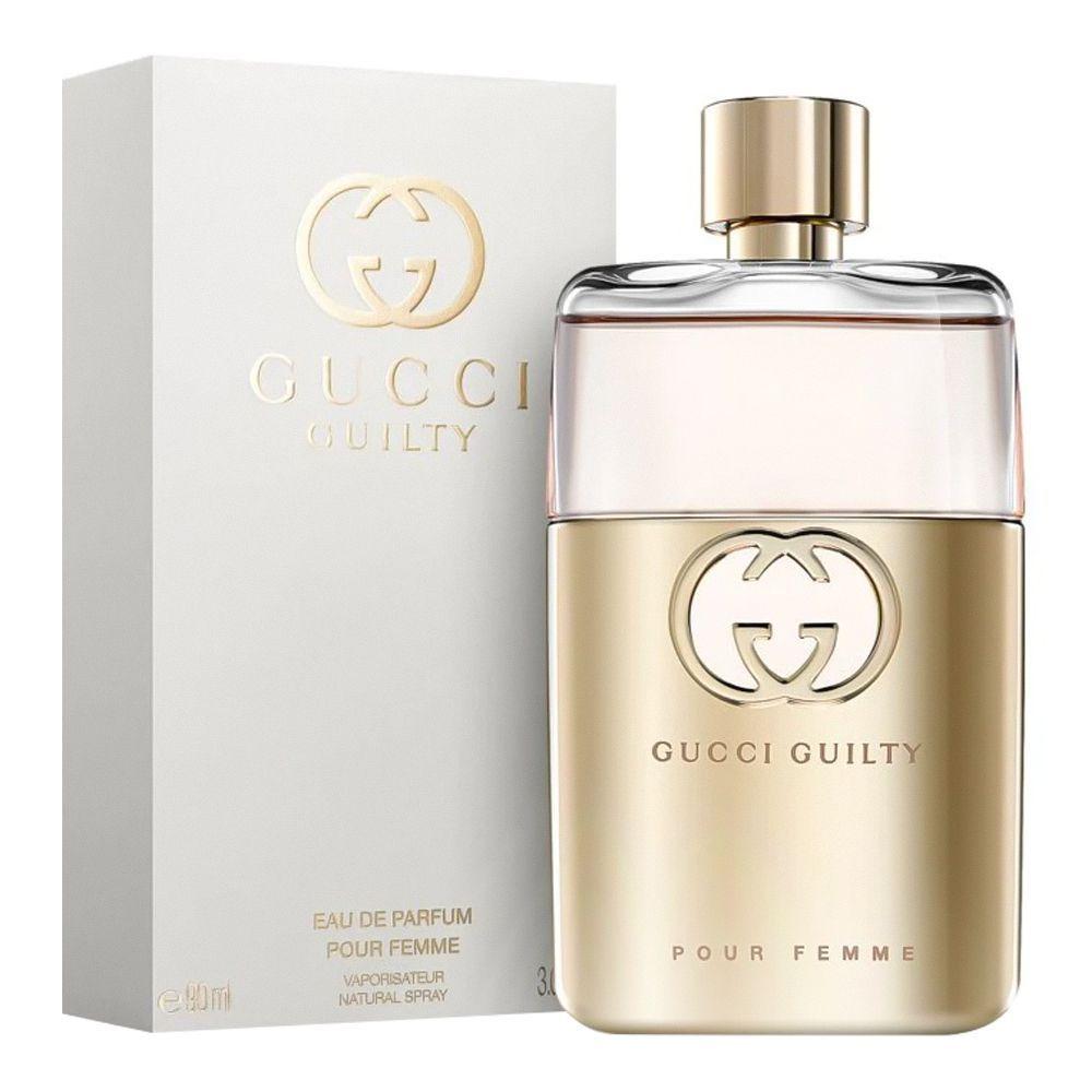 Gucci Guilty perfume bottle and packaging on a white background